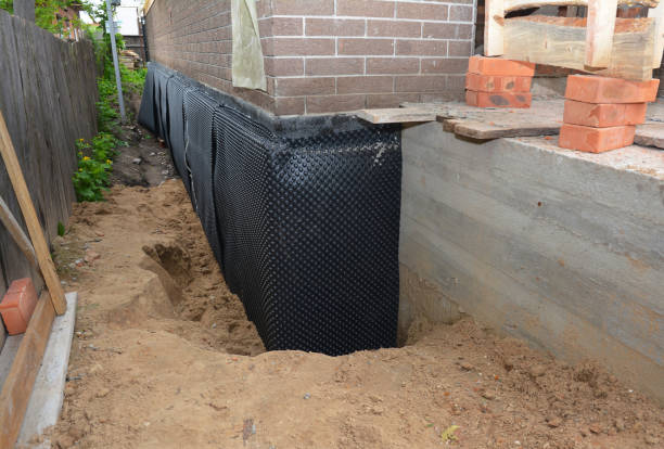 Happy homeowners after waterproofing job in Lambertville